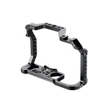 Camera cage for Canon R5 Mark II, black metal frame with multiple threaded holes, shown without camera