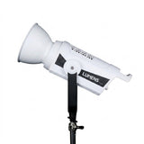 Lumens 450W bi-colour COB light in white with reflector, mounted on a light stand